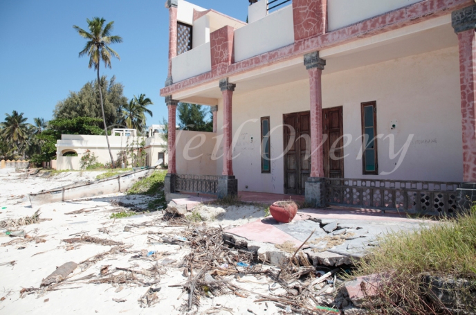 Sea level rises damage homes on the beach, Jambiani, Zanzibar