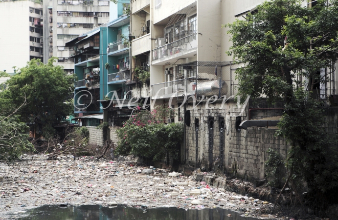 Rubbish in polluted river in Manila, Philippines